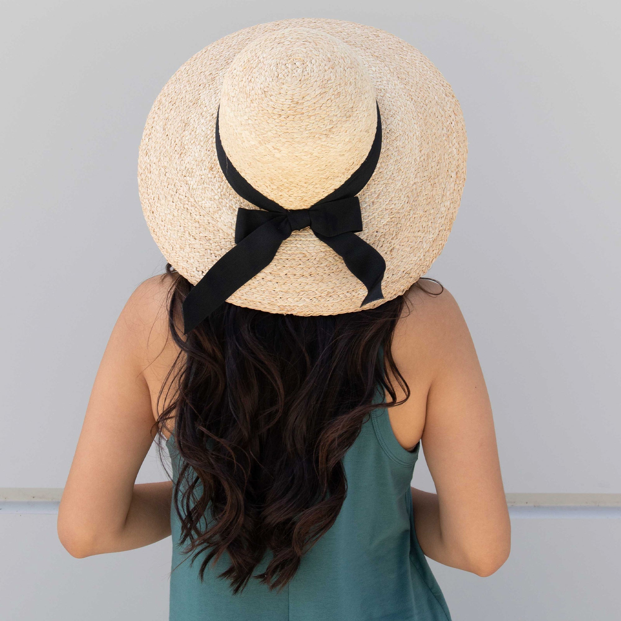 Women's Large Brim Raffia Hat With A Black Ribbon 5 Women's Large Brim Raffia Hat With A Black Ribbon